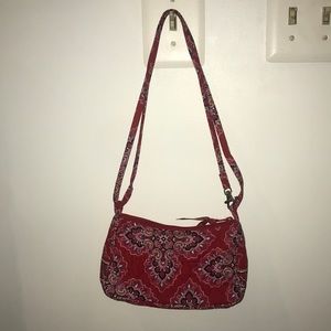 Small purse with adjustable length strap